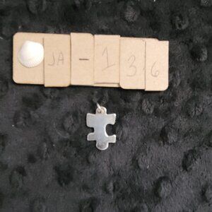 Item # JA136 James Avery Retired Puzzle Piece Charm